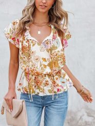 Milan Kiss Bluzka w kolorze kremowym ze wzorem rozmiar: M. Brązowe bluzki Milan Kiss, m, bez wzorów, bez kołnierzyka, bez ramiączek. Za 101.23 zł.