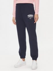 Tommy Jeans Spodnie dresowe DW0DW16379 Granatowy Relaxed Fit. Niebieskie spodnie sportowe Tommy Jeans, bez wzorów, z bawełny. Za 469.99 zł.