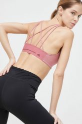 Adidas Performance biustonosz do jogi CoreFlow kolor różowy gładki. Czerwone biustonosze sportowe adidas Performance, bez wzorów, z materiału, na fitness i siłownię. Za 229.99 zł.