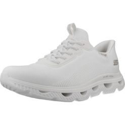 Buty SKECHERS SLIP-INS BOBS ARC WAVES Biały. Białe buty trekkingowe Skechers, z syntetyku, bez zapięcia. Za 390.99 zł.