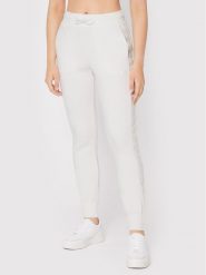 Guess Spodnie dresowe V2YB18 K7UW2 Biały Regular Fit. Białe spodnie dresowe Guess, z aplikacjami, z dresówki. Za 189.99 zł.