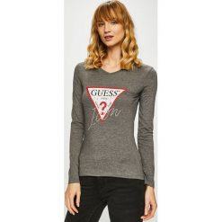Guess Jeans - Bluzka. Czarne bluzki Guess Jeans, l, z aplikacjami, z bawełny, bez kołnierzyka, bez ramiączek. W wyprzedaży za 119.90 zł.