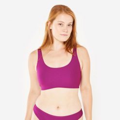 Góra kostiumu kąpielowego surfingowego damska Olaian Aurely teksturowana. Fioletowe bikini OLAIAN, bez wzorów, z elastanu, sportowe. Za 69.99 zł.