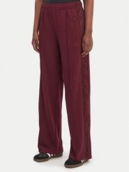 Adidas Spodnie dresowe Firebird Lace KC6445 Bordowy Loose Fit. Czerwone spodnie dresowe adidas, bez wzorów, z dresówki. Za 319.99 zł.