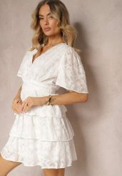 Biała Sukienka o Rozkloszowanym Kroju z Dekoltem w Serek i Falbankami Drapia. Białe sukienki Renee, na imprezę, l, bez wzorów, eleganckie, bez kołnierzyka, bez ramiączek, mini, rozkloszowane. W wyprzedaży za 127.99 zł.