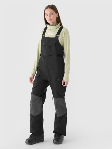 4F Spodnie snowboardowe z szelkami membrana 10000 damskie - czarne XS. Czarne spodnie narciarskie 4f, bez wzorów, z dzianiny, narciarskie. Za 699.99 zł.