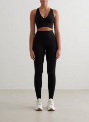 Damskie legginsy z wysokim stanem, squat proof, modelujące Sculpting Fit czarne. Czarne legginsy AIM'N, bez wzorów, z lycry, wizytowe. Za 424.00 zł.