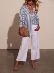 Milan Kiss Bluzka w kolorze niebiesko-białym rozmiar: L. Białe bluzki Milan Kiss, l, bez wzorów, bez kołnierzyka, bez ramiączek. Za 152.99 zł.