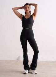 Damskie legginsy rozszerzane nogawki, wysoki stan, squat proof Sense czarny. Czarne legginsy AIM'N, bez wzorów, z elastanu, street. Za 339.00 zł.