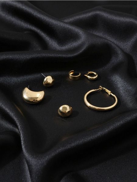 Kolczyki z błyszczącym wykończeniem 7 pack - złoty. Żółte kolczyki Sinsay, złote. Za 19.99 zł.