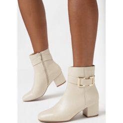 Beżowe Botki Celata. Brązowe botki Born2be, z aplikacjami, eleganckie, za kostkę, bez obcasa, na obcasie, bez zapięcia. W wyprzedaży za 118.99 zł.