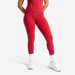 Legginsy fitness damskie Domyos wysoki stan. Czerwone legginsy DOMYOS, bez wzorów, z elastanu, sportowe. Za 119.99 zł.