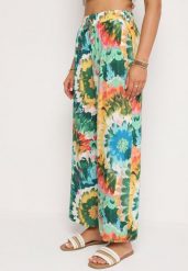 Zielono-Niebieskie Szerokie Spodnie z Wiskozą i Wysokim Stanem ze Wzorem Tie-Dye i Gumką w Pasie Halflea. Zielone jeansy Born2be, na lato, bez wzorów, z jeansu, z podwyższonym stanem. Za 59.99 zł.