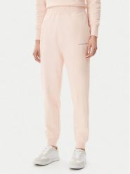 Calvin Klein Jeans Spodnie dresowe Monologo J20J225354 Różowy Slim Fit. Czerwone spodnie dresowe Calvin Klein Jeans, bez wzorów, z bawełny. Za 219.99 zł.