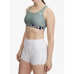 Stanik sportowy Under Armour HeatGear Authentics Mid Branded Bra. Zielone biustonosze sportowe Under Armour, bez wzorów, na fitness i siłownię. Za 102.99 zł.