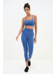 Onamaste Legginsy sportowe w kolorze niebieskim rozmiar: S/M. Niebieskie legginsy Onamaste, bez wzorów, z materiału, sportowe. Za 131.74 zł.