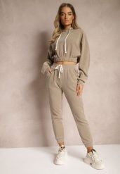 Ciemnobeżowy Komplet Dresowy z Dodatkiem Bawełny Spodnie z Gumką w Pasie i Bluza z Kapturem Hasaria. Brązowe bluzy Renee, l, bez wzorów, z bawełny, bez ramiączek, z kapturem. W wyprzedaży za 111.99 zł.