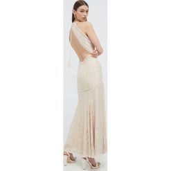 Guess sukienka kolor beżowy maxi dopasowana. Brązowe sukienki Guess, l, z aplikacjami, bez kołnierzyka, bez ramiączek, maxi, dopasowane. Za 779.99 zł.
