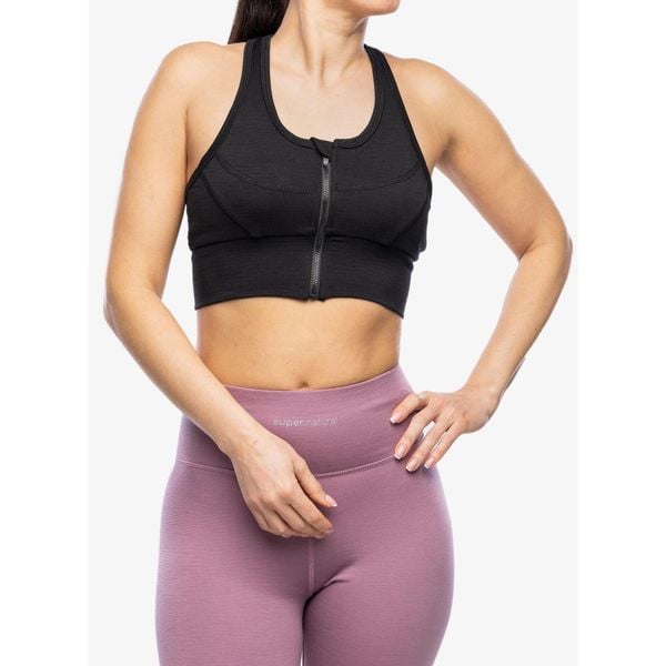 Stanik sportowy Super.natural Motion Zip Top. Czarne biustonosze sportowe super.natural, bez wzorów, na fitness i siłownię. Za 251.99 zł.