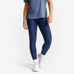 Legginsy fitness damskie. Niebieskie legginsy DOMYOS, bez wzorów, z elastanu, sportowe. Za 69.99 zł.