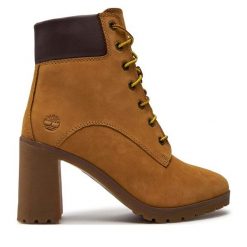 Trzewiki Timberland. Żółte botki Timberland, bez wzorów, bez obcasa, na słupku, bez zapięcia. Za 659.99 zł.