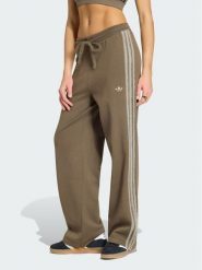 Adidas Spodnie dresowe Firebird KS7362 Brązowy Regular Fit. Brązowe spodnie dresowe adidas, bez wzorów, z dresówki. Za 314.99 zł.