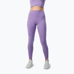 Legginsy Girlfriend Collective Compressive. Fioletowe legginsy GIRLFRIEND COLLECTIVE, bez wzorów, sportowe. Za 209.99 zł.
