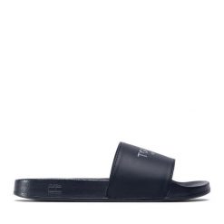 Klapki Tommy Hilfiger. Niebieskie klapki Tommy Hilfiger, bez wzorów, bez obcasa, bez zapięcia. Za 149.99 zł.