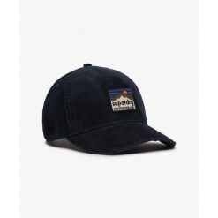 Damska czapka typu trucker Superdry. Niebieskie czapki z daszkiem Superdry, bez wzorów. Za 148.20 zł.