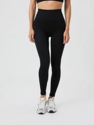 Bjorn_borg STUDIO SEAMLESS RIBBED TIGHTS — bezszwowe, prążkowane legginsy –. Czarne legginsy Björn Borg, bez wzorów, z poliamidu, eleganckie. Za 319.50 zł.