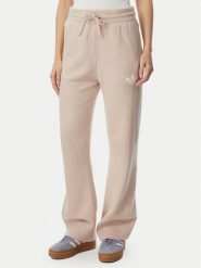 Adidas Spodnie dresowe Essentials KR9180 Beżowy Loose Fit. Brązowe spodnie dresowe adidas, bez wzorów, z bawełny. Za 299.99 zł.
