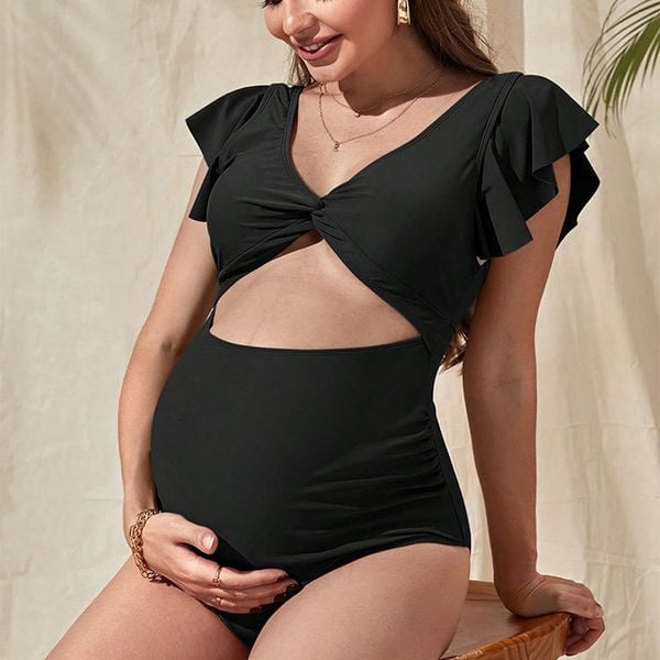 Strój kąpielowy ciążowy z falbanką na plażę i basen Britani. Czarne stroje jednoczęściowe Intica, bez wzorów. Za 149.00 zł.