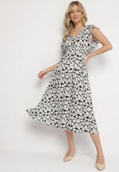 Czarna Bawełniana Sukienka w Kwiatki o Rozkloszowanym Kroju z Gumką Alanilia. Czarne sukienki Born2be, na co dzień, l, bez wzorów, z bawełny, eleganckie, bez kołnierzyka, bez ramiączek, maxi, kopertowe. Za 69.99 zł.