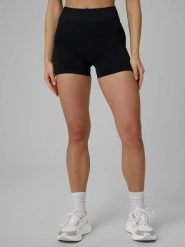 4F Legginsy sportowe w kolorze czarnym rozmiar: XS/S. Czarne legginsy 4f, bez wzorów, z materiału, sportowe. Za 43.68 zł.