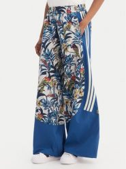 Adidas Spodnie dresowe Farm Rio Premium KD4643 Niebieski Loose Fit. Niebieskie spodnie dresowe adidas, bez wzorów, z dresówki. Za 529.99 zł.