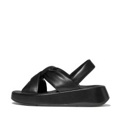 Sandały damskie FitFlop F-Mode Knot Soft-Leather Flatform B/Strap. Czarne sandały Flip Flop, bez wzorów, ze skóry, eleganckie, bez obcasa, na płaskiej podeszwie, bez zapięcia. Za 729.50 zł.