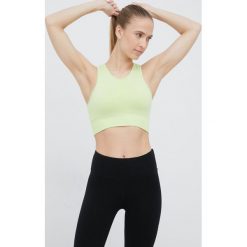 Superdry biustonosz sportowy kolor zielony gładki. Zielone biustonosze sportowe Superdry, bez wzorów, z dzianiny, na fitness i siłownię. W wyprzedaży za 184.99 zł.