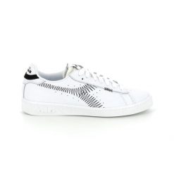 Trampki damskie DIADORA GAME L LOW ZIG ZAG WN. Białe trampki Diadora, bez wzorów, bez zapięcia. Za 199.99 zł.