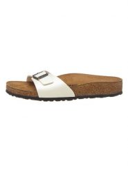 Birkenstock Klapki "Madrid" w kolorze kremowym rozmiar: 39. Brązowe klapki Birkenstock, bez wzorów, klasyczne, z otwartym noskiem, bez obcasa, bez zapięcia. Za 218.05 zł.