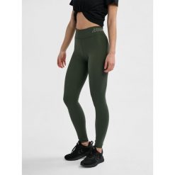 Damskie legginsy Hummel. Brązowe legginsy Hummel, bez wzorów, z dżerseju, sportowe. Za 174.50 zł.