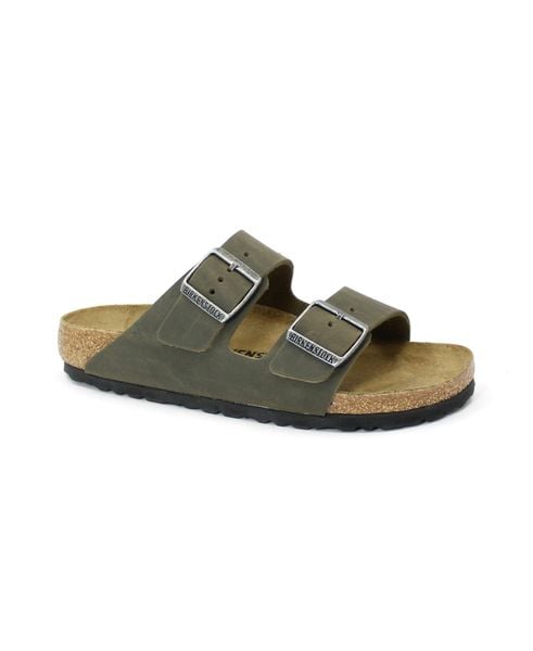 Klapki damskie Birkenstock 1027039. Zielone klapki Birkenstock, bez wzorów, z materiału, bez obcasa, bez zapięcia. Za 785.00 zł.