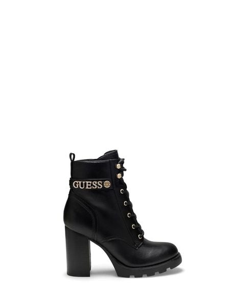 Guess Botki FLFNEE ELE10 Czarny. Czarne botki Guess, z aplikacjami, ze skóry, bez obcasa, na słupku, bez zapięcia. Za 634.99 zł.