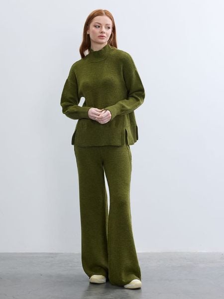 BGN Sweter w kolorze zielonym rozmiar: 36. Zielone swetry BGN, bez wzorów, bez ramiączek. Za 109.52 zł.