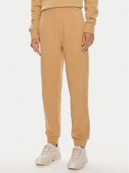 Calvin Klein Spodnie dresowe Nano Logo K20K207214 Beżowy Relaxed Fit. Brązowe spodnie dresowe Calvin Klein, bez wzorów, z bawełny. Za 279.99 zł.