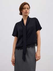 BGN Bluzka w kolorze czarnym rozmiar: 34. Czarne bluzki BGN, bez wzorów, z koronki, bez kołnierzyka, bez ramiączek. Za 96.37 zł.