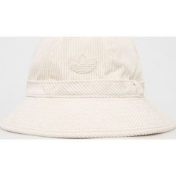 Adidas Originals kapelusz kolor beżowy. Brązowe kapelusze adidas Originals, bez wzorów, z materiału. W wyprzedaży za 99.99 zł.