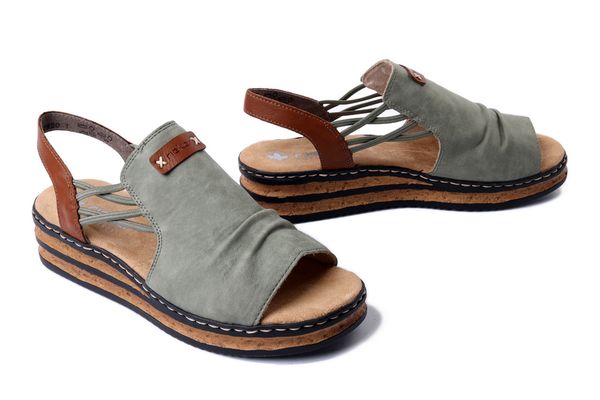 RIEKER 62962-52 green, sandały damskie. Zielone sandały Rieker, bez wzorów, bez obcasa, na koturnie, bez zapięcia. Za 254.92 zł.