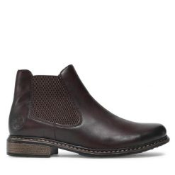 Botki Rieker. Brązowe botki Rieker, bez wzorów, bez obcasa, na płaskiej podeszwie, bez zapięcia. Za 279.99 zł.