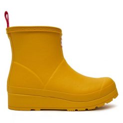 Kalosze Hunter. Żółte kalosze Hunter, bez wzorów, bez zapięcia. Za 289.99 zł.