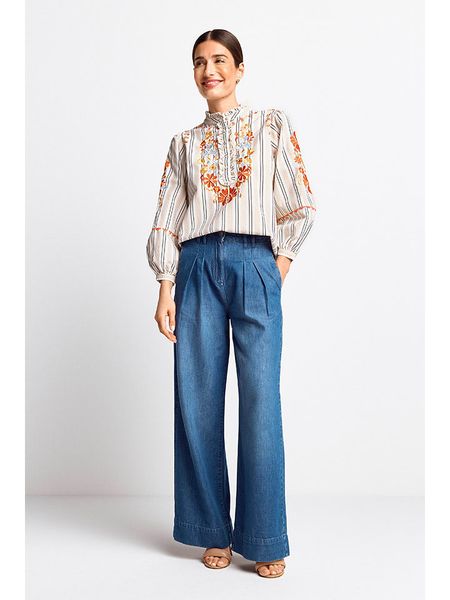 Rich & Royal Spodnie w kolorze niebieskim rozmiar: 26. Niebieskie spodnie materiałowe Rich & Royal, bez wzorów, z materiału, z podwyższonym stanem. Za 148.61 zł.